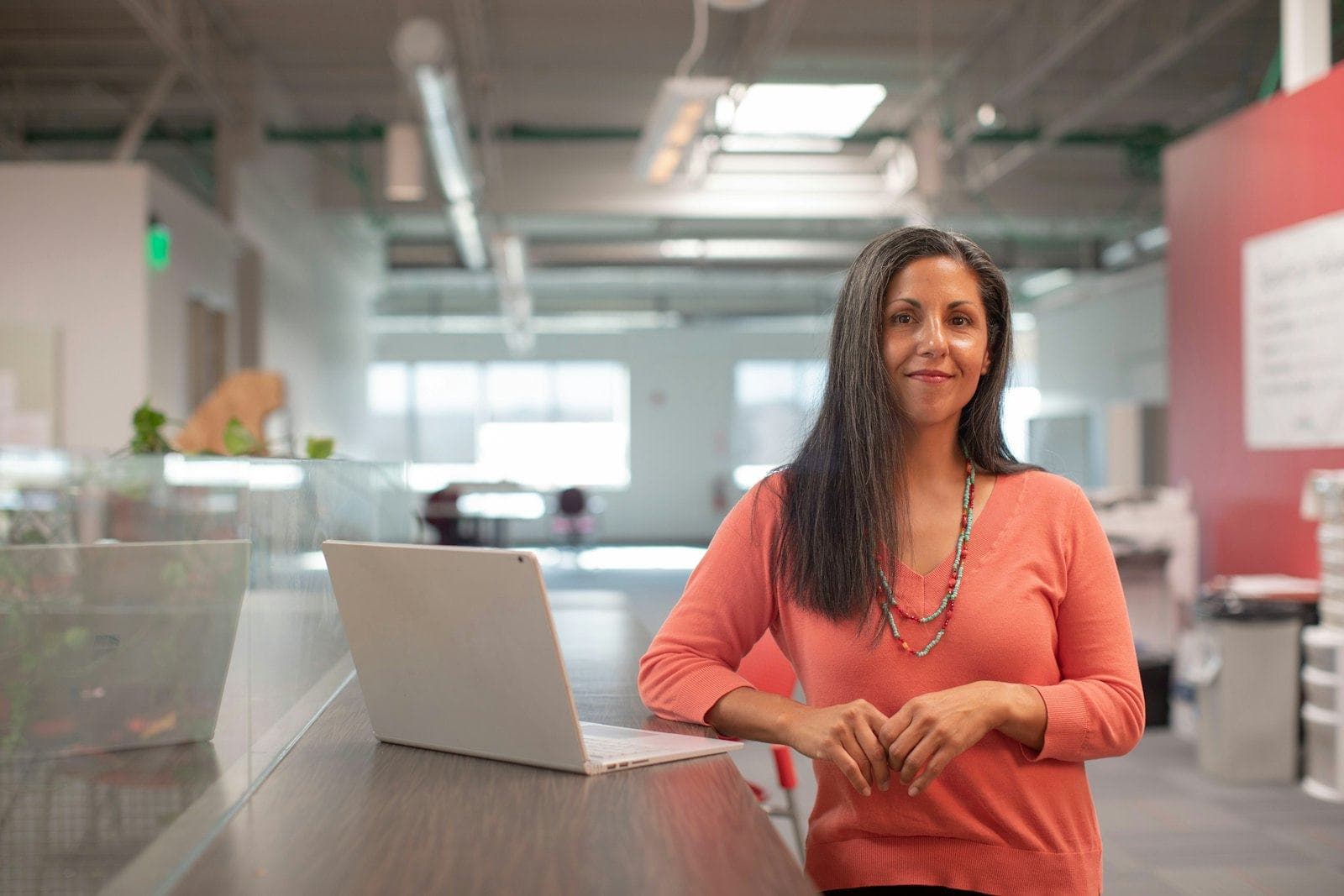 A professional working securely on a company laptop
